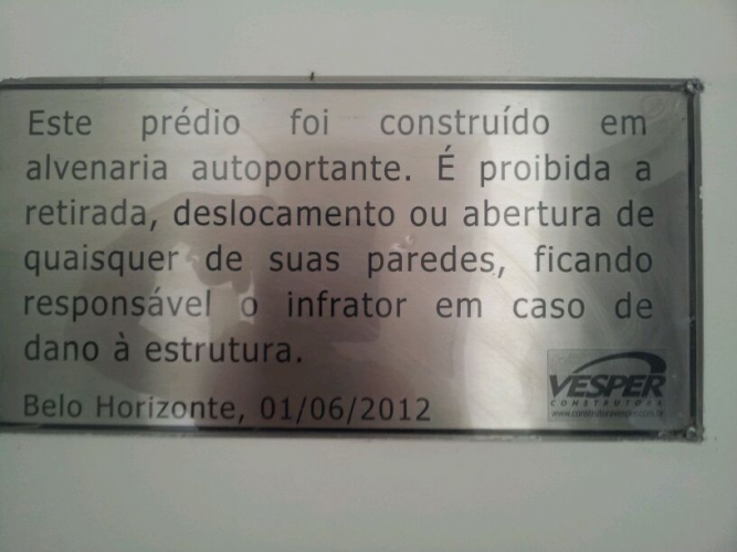 Placa de advertencia em a�o inox