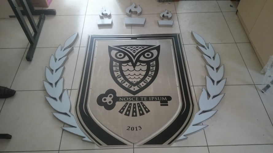 BRASAO DE A�O INOX GRAVADO UFOB